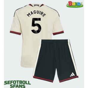 Manchester United Harry Maguire #5 Tredjeställ Barn 2026-27 Kortärmad (+ Korta byxor)